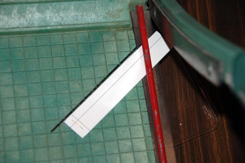 Assembly of strips positioned for the first (non-stapled end) cut.